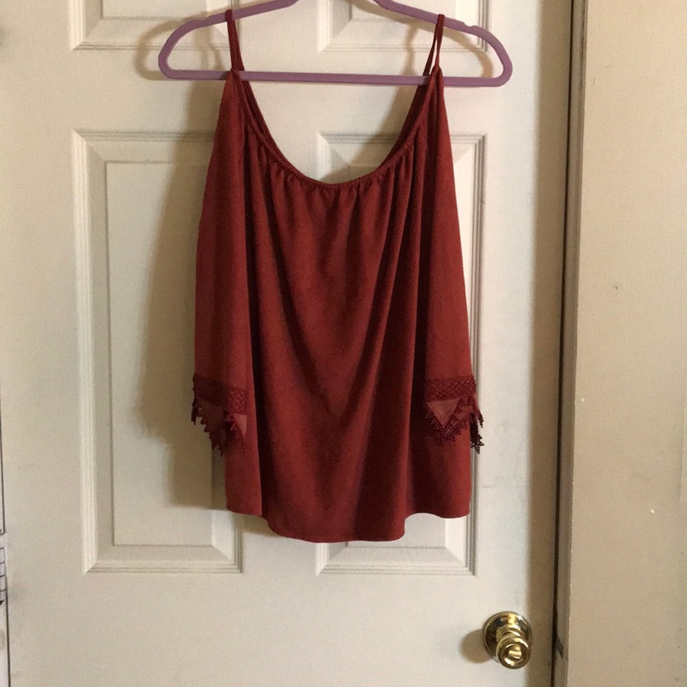 This is a very cute top, it’s been worn twice.